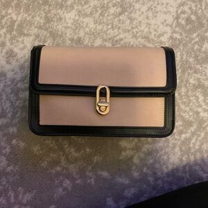 Elegant Black and Cream Crossbody Bag